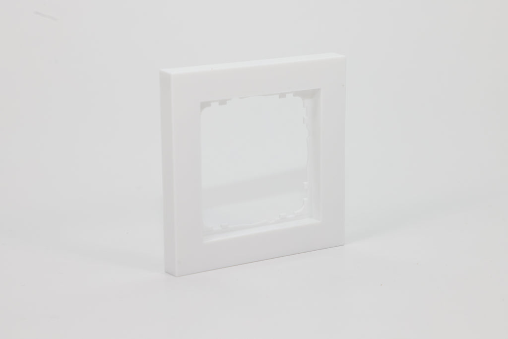 White single-gang frame for a 55 mm KNX wall control – left view